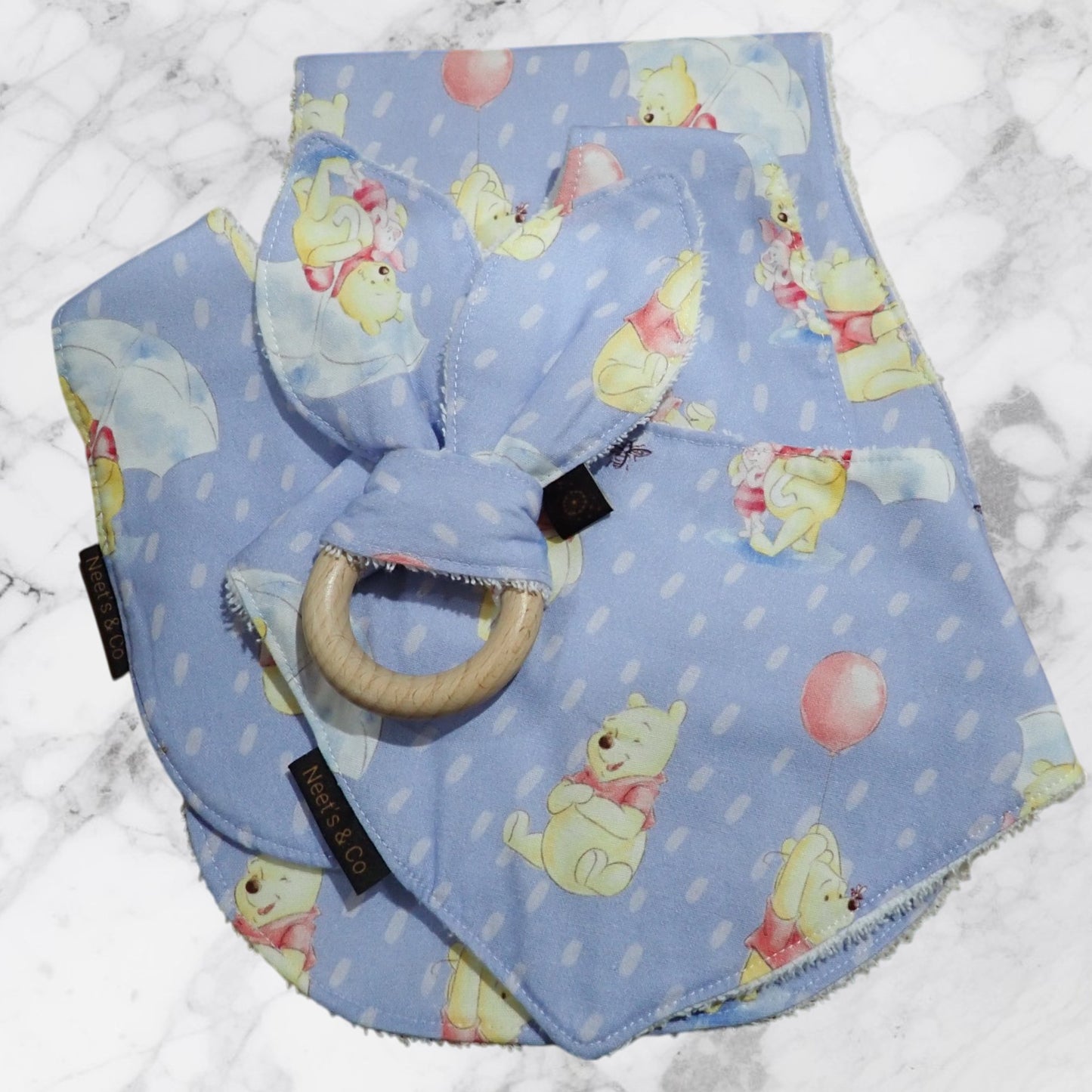 Baby Bib, Bandana Big, Burp Cloth and Teether 3 - 18 months Winnie the Pooh design on a light Blue Background